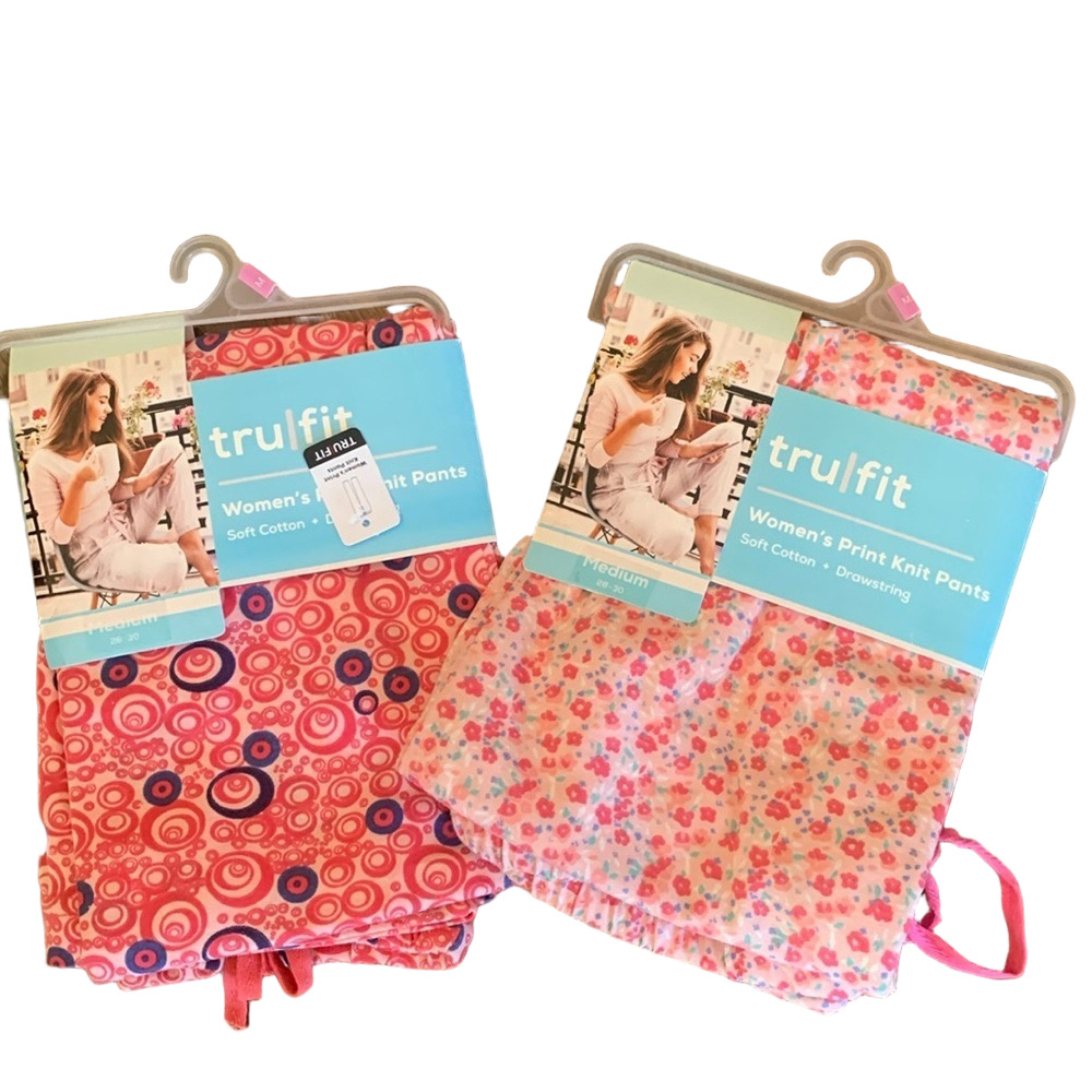 (2) new medium women print knit pants in box 29
